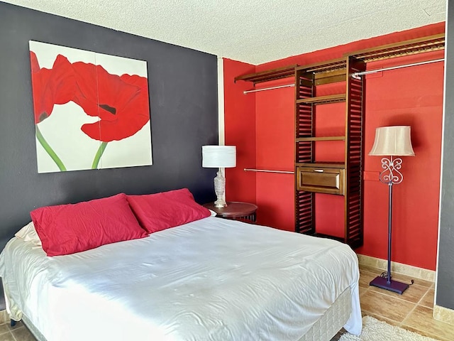 bedroom featuring a textured ceiling