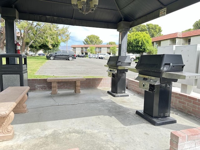 view of patio featuring area for grilling and a gazebo