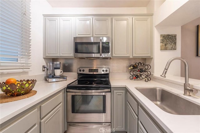 kitchen with sink and stainless steel appliances