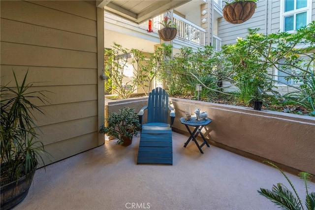 view of patio with a balcony