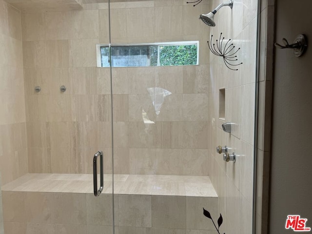 bathroom featuring walk in shower