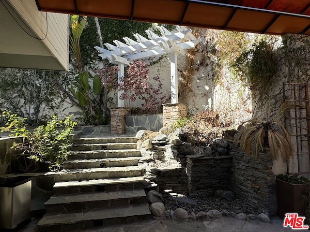 view of patio / terrace with a pergola