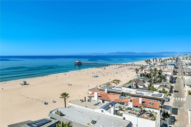 aerial view featuring a water view and a beach view