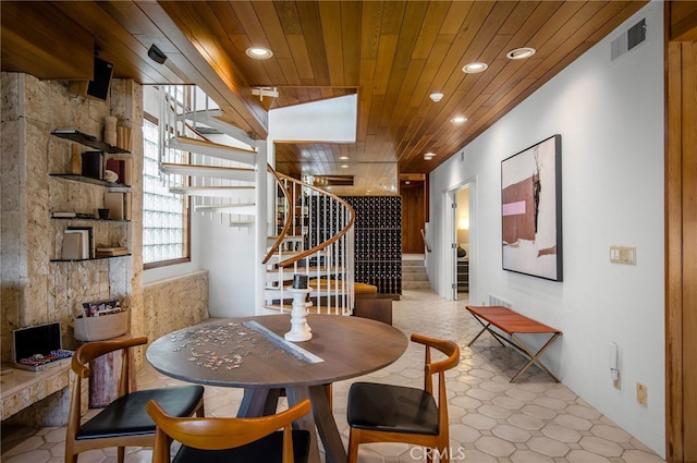 wine cellar with wooden ceiling