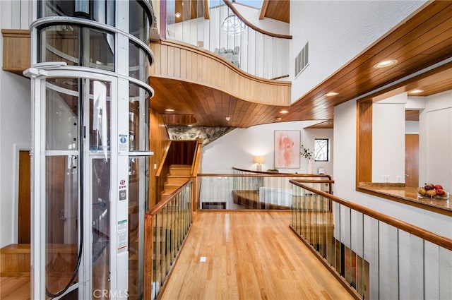 hallway featuring light hardwood / wood-style flooring