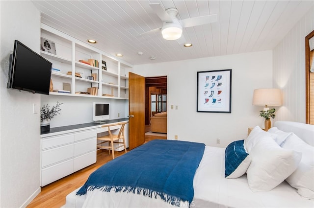 bedroom with built in desk, ceiling fan, wooden ceiling, and light wood-type flooring