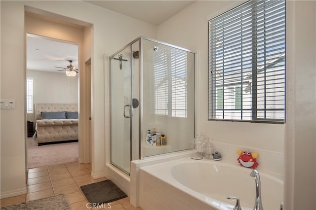 bathroom featuring independent shower and bath, ceiling fan, and tile patterned flooring