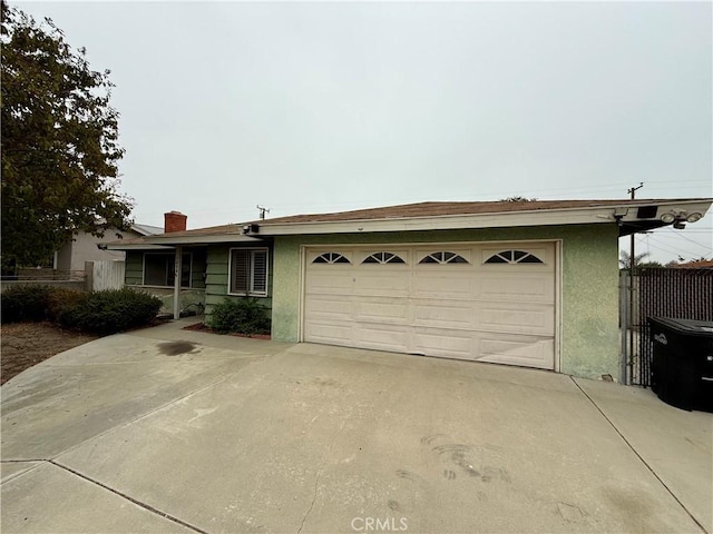 ranch-style house featuring a garage