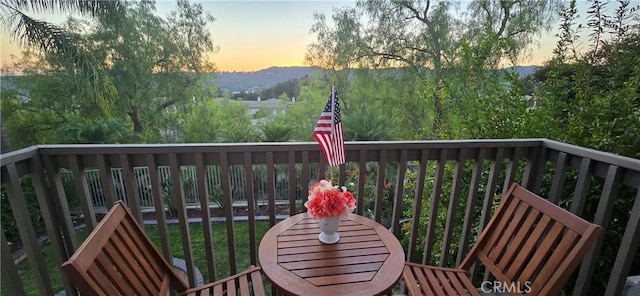 wooden balcony featuring a deck