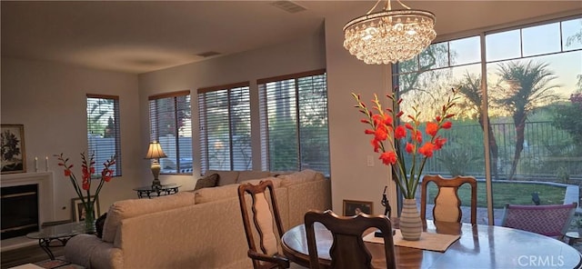 dining space featuring an inviting chandelier