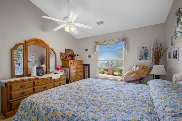 bedroom with ceiling fan and vaulted ceiling