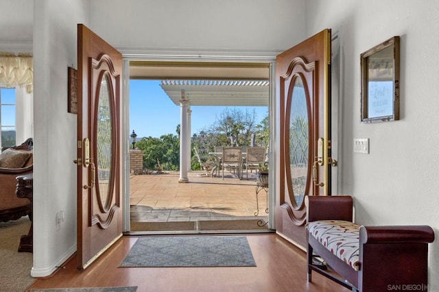 doorway featuring hardwood / wood-style floors