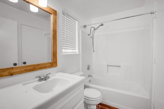 full bathroom with vanity, toilet, and bathtub / shower combination