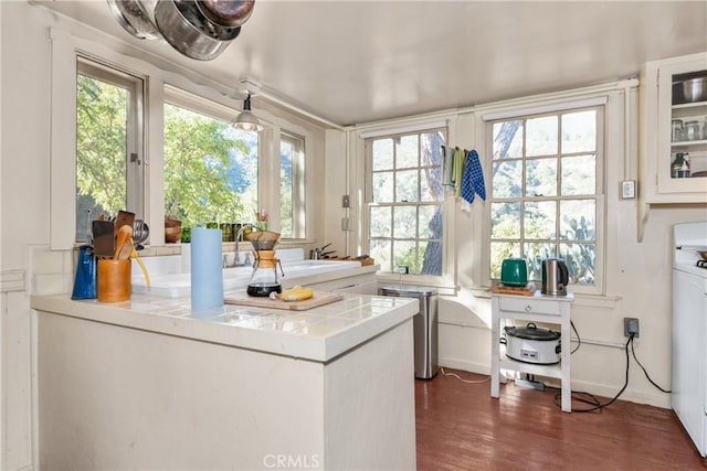 sunroom / solarium featuring sink