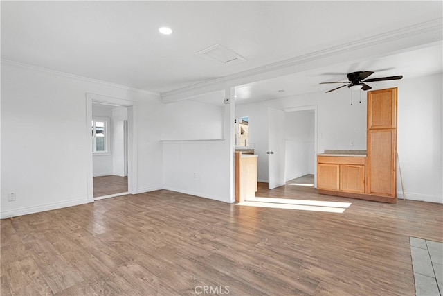 unfurnished living room with crown molding, light hardwood / wood-style floors, and ceiling fan