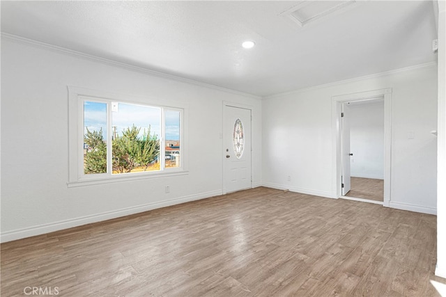 interior space featuring light hardwood / wood-style flooring and crown molding