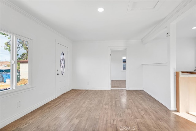 interior space featuring light hardwood / wood-style flooring and crown molding