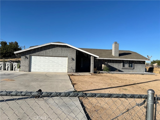 single story home featuring a garage