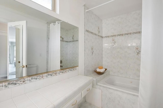 bathroom featuring toilet and shower / bath combo with shower curtain