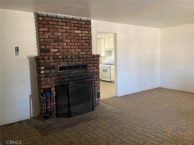 unfurnished living room with carpet floors and a brick fireplace