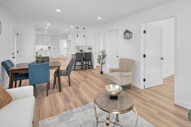 living room featuring light wood-type flooring