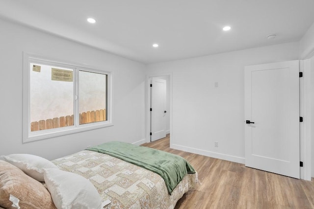 bedroom featuring light hardwood / wood-style floors