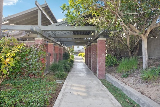 view of parking / parking lot featuring a carport