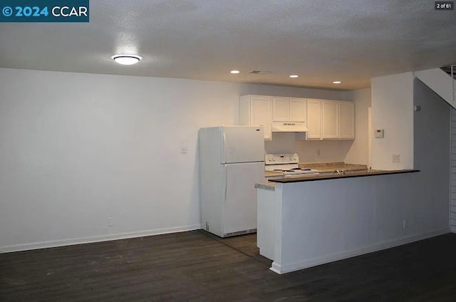 kitchen with kitchen peninsula, dark hardwood / wood-style flooring, white cabinetry, a textured ceiling, and white appliances