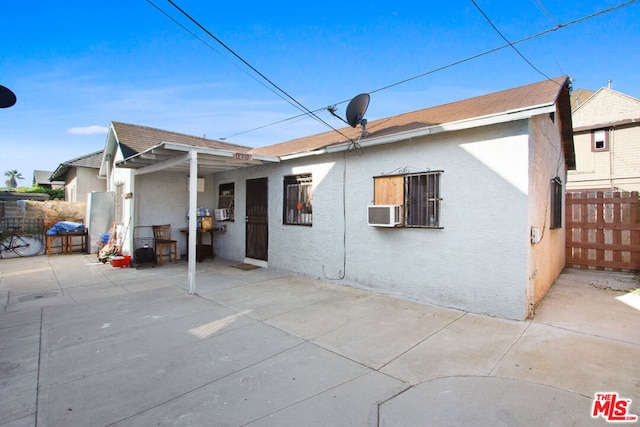 rear view of house featuring a patio area