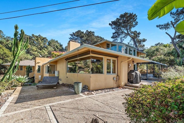 view of front facade featuring a patio area