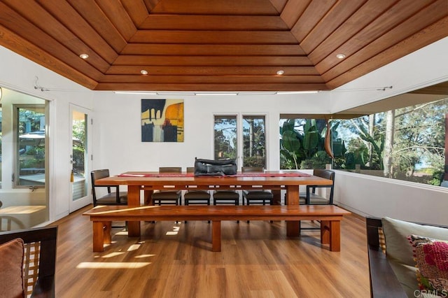 sunroom / solarium with wooden ceiling and lofted ceiling