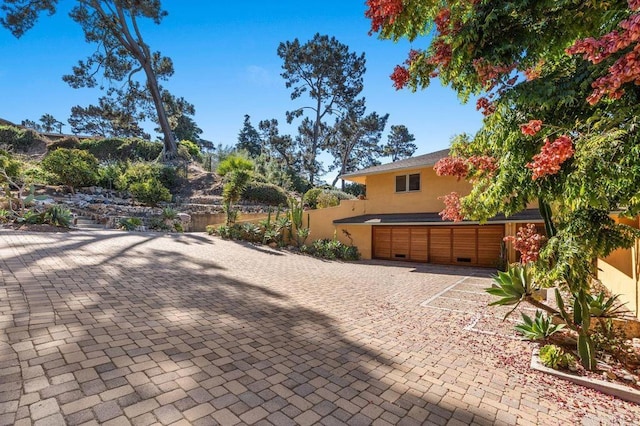 view of patio featuring a garage