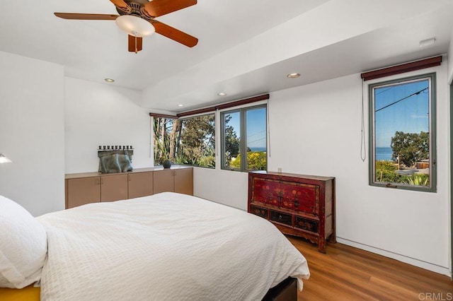 bedroom featuring ceiling fan and wood-type flooring