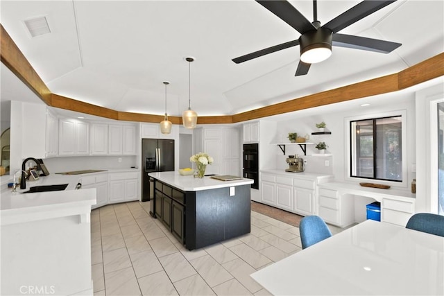 kitchen with sink, white cabinetry, decorative light fixtures, a kitchen island, and stainless steel fridge with ice dispenser