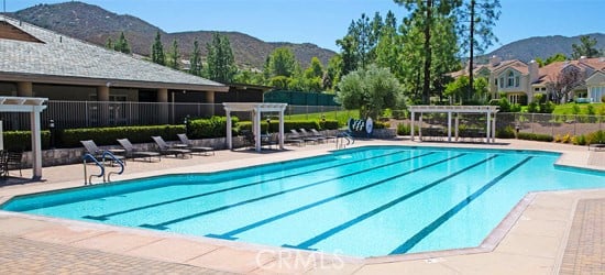 view of pool featuring a mountain view, a patio area, and a pergola