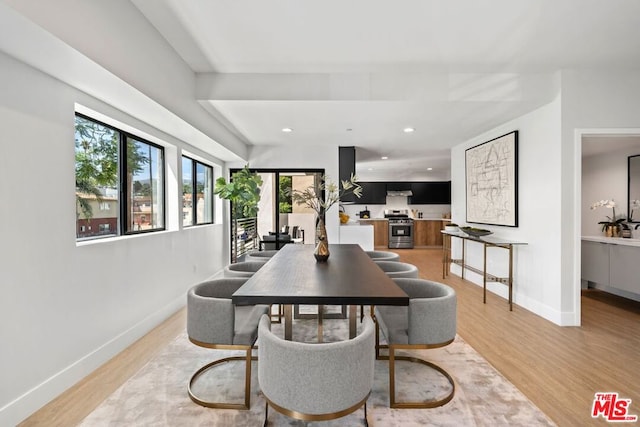 dining room with light wood-type flooring