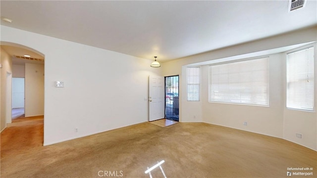 view of carpeted spare room