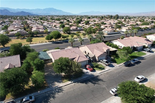 drone / aerial view featuring a mountain view