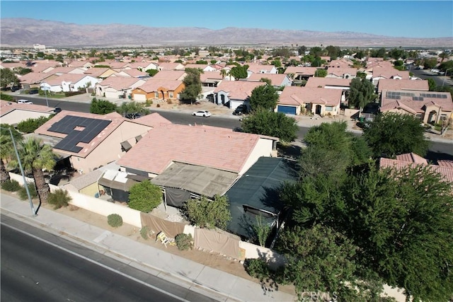 drone / aerial view featuring a mountain view