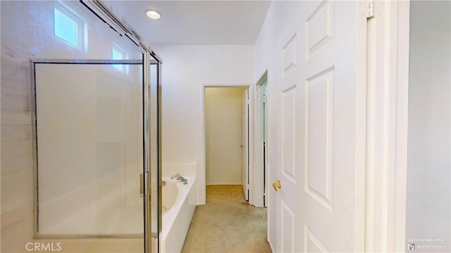 bathroom featuring plus walk in shower