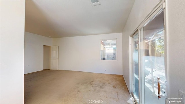 view of carpeted spare room