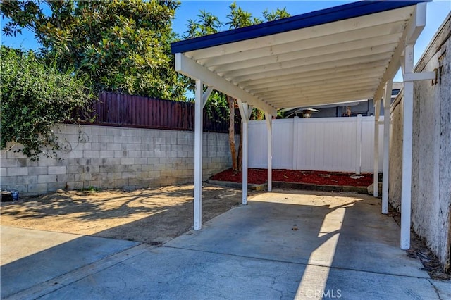 view of patio featuring a carport