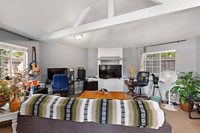 living room featuring carpet and vaulted ceiling with beams