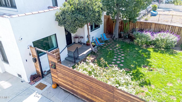 view of yard featuring fence