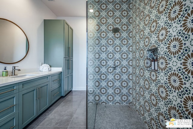 bathroom with tile patterned flooring and vanity