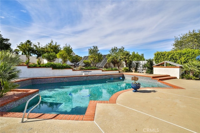 view of pool with a patio