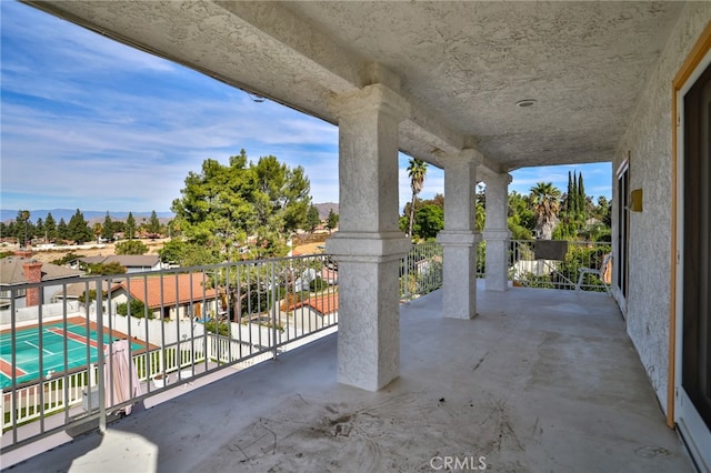 view of patio with a balcony