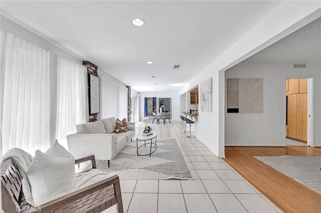 living room with light hardwood / wood-style floors