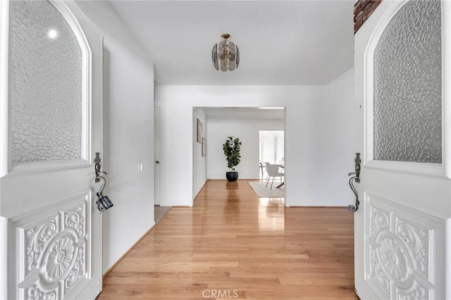 entryway with light wood-type flooring