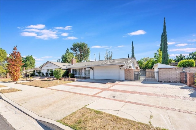 ranch-style home with a garage